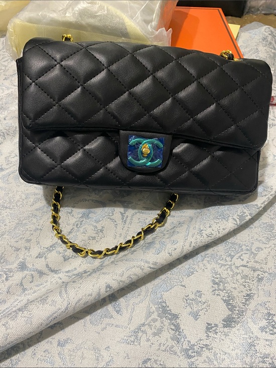 CHANEL Handbags - CHANEL Black Quilted Shoulder Bag with Gold Chain and Iridescent CC Turnlock